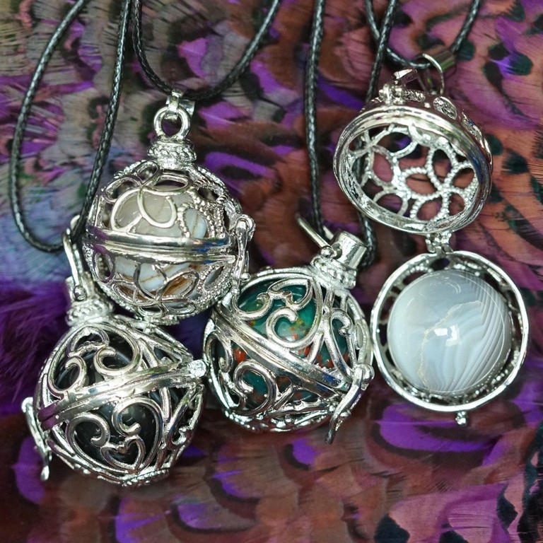 Cage Pendant Necklaces with intuitive sphere for magical adornment