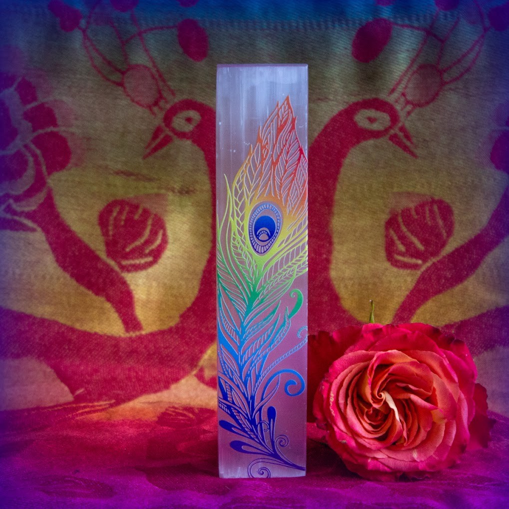 Selenite wand with printed peacock feather in chakra colors
