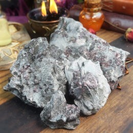 Grounding and Healing Almandine Garnet in Graphite Matrix