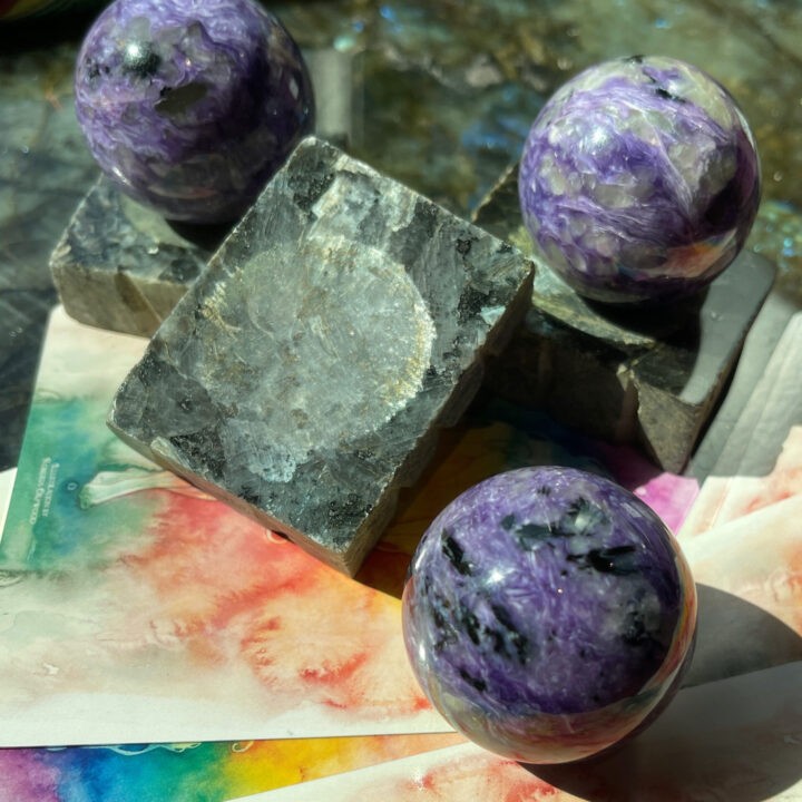 Courage Through Change Charoite Sphere with Larvikite Sphere Stand